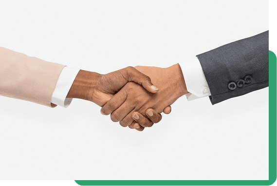 Two people shaking hands representing a business partnership